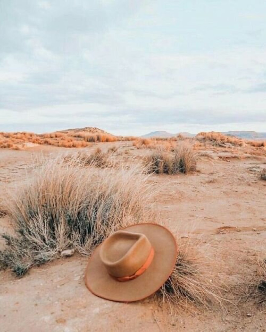 Open desert land under a wide sky